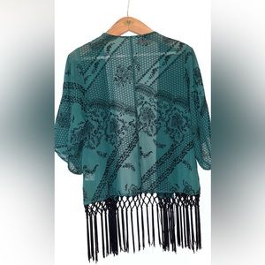 Green kimono with fringe